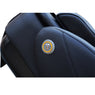 Close-up of the black leather side panel with seal emblem on the Luraco i9 Max Plus massage chair – photo 10